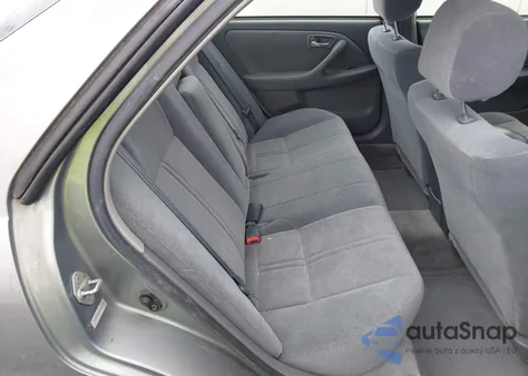 2001 Toyota Camry Le from USA, damaged, VIN JT2BG22K410587070